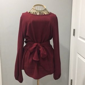 Red belted blouse